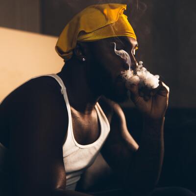 Here is an image of a man smoking